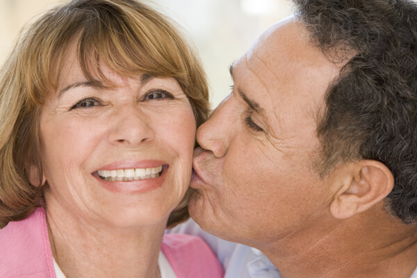 Man Kissing Wife